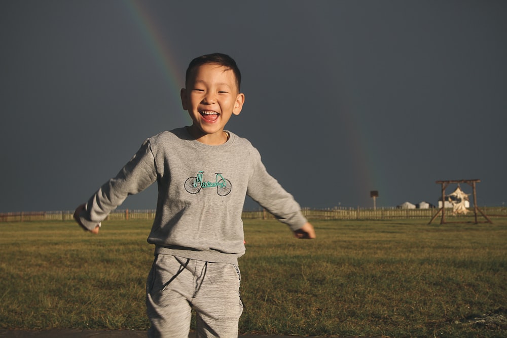 boy on grass field