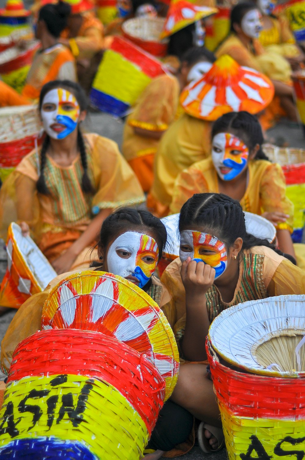 women wearing face mask on festival at daytime