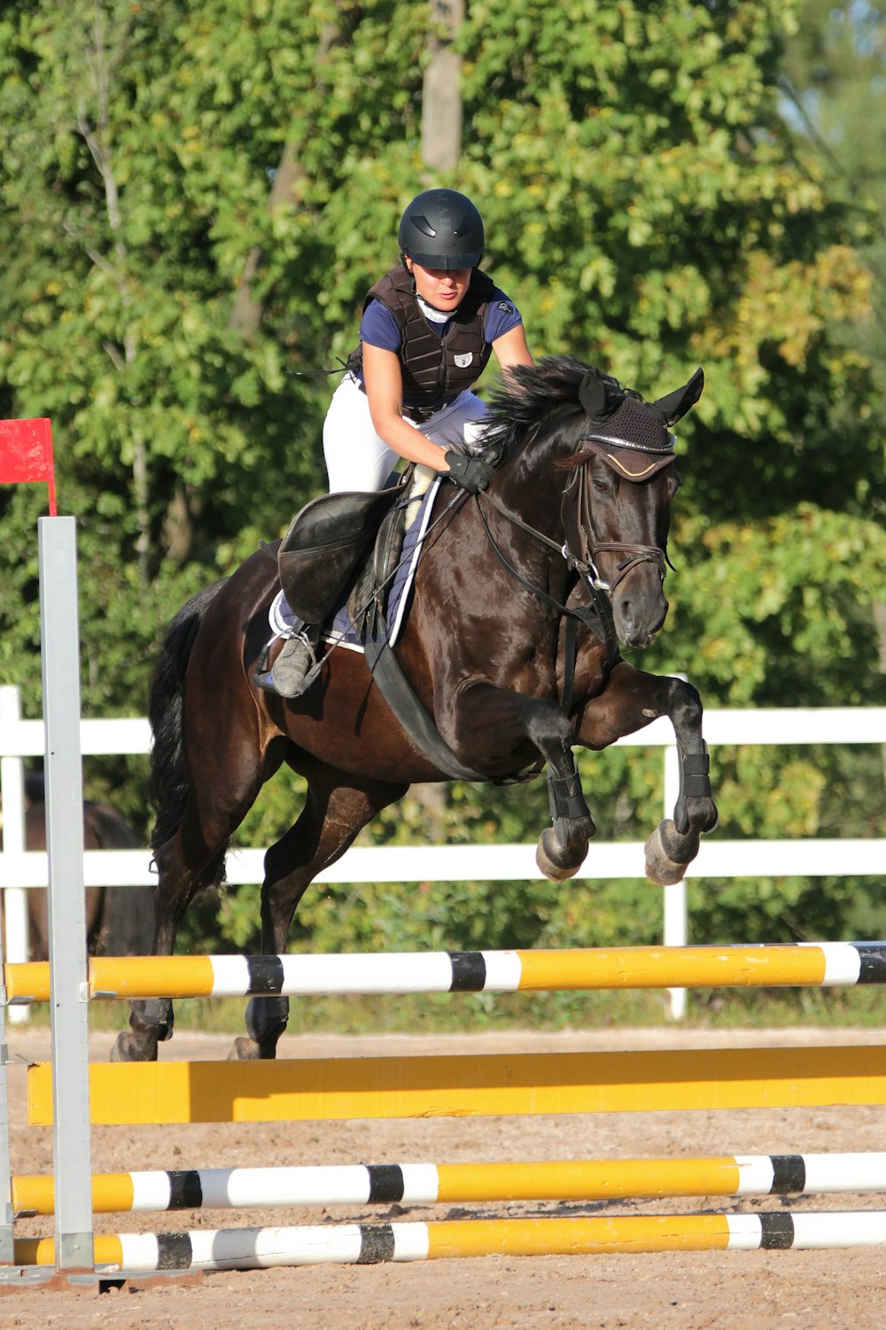 Mujer montando a caballo