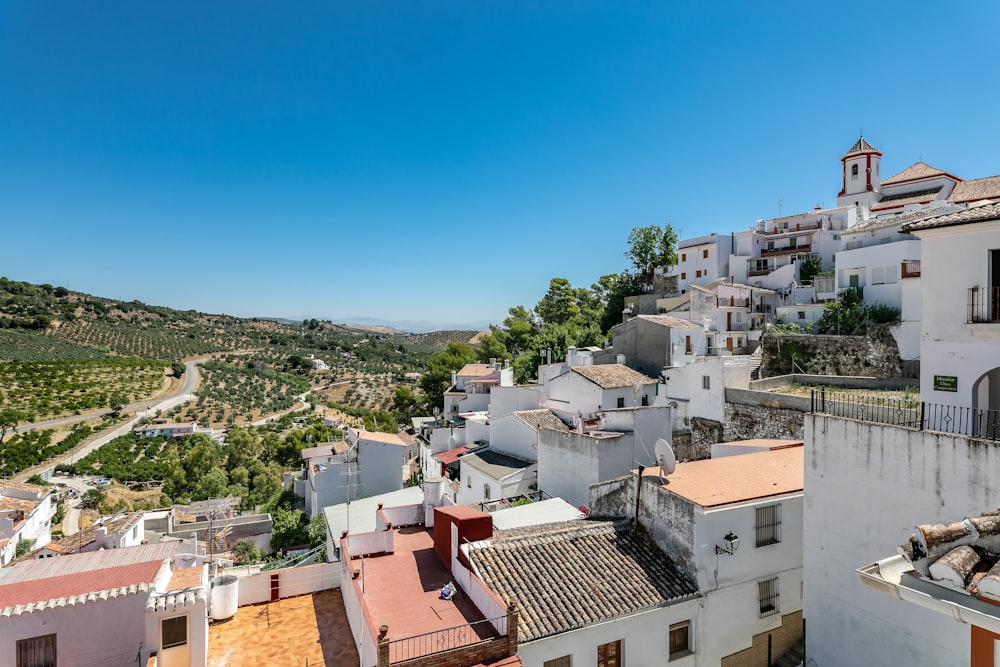 a view of a town from the top of a hill