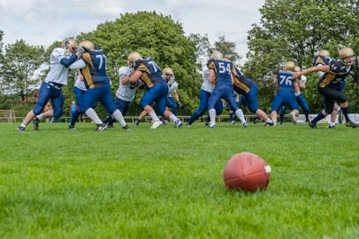 men playing football super bowl google meet background