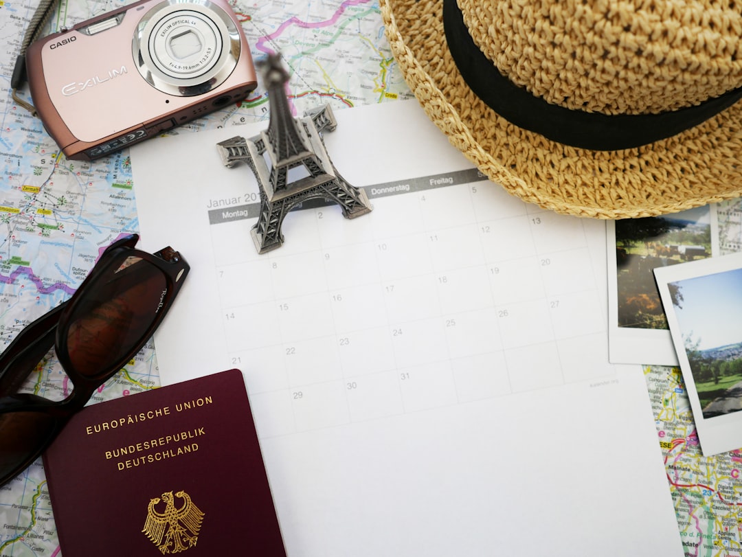 assorted color items on table, travel booking