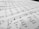 A close-up view of a sheet of music with musical notes and lyrics printed in black ink on a white background. The focus is on the lower part, where the notes and the words 'wake my spirit' and 'perish' are visible.
