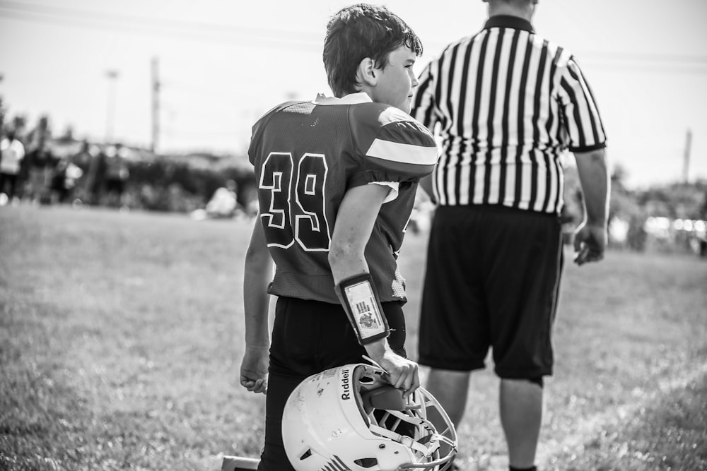 grayscale photo of boy