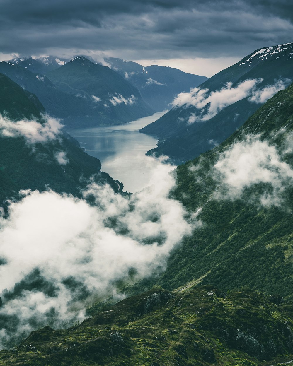 green mountains under white clouds during daytime