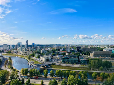 Vilnius from the river, the old town spires and the new towers beyond