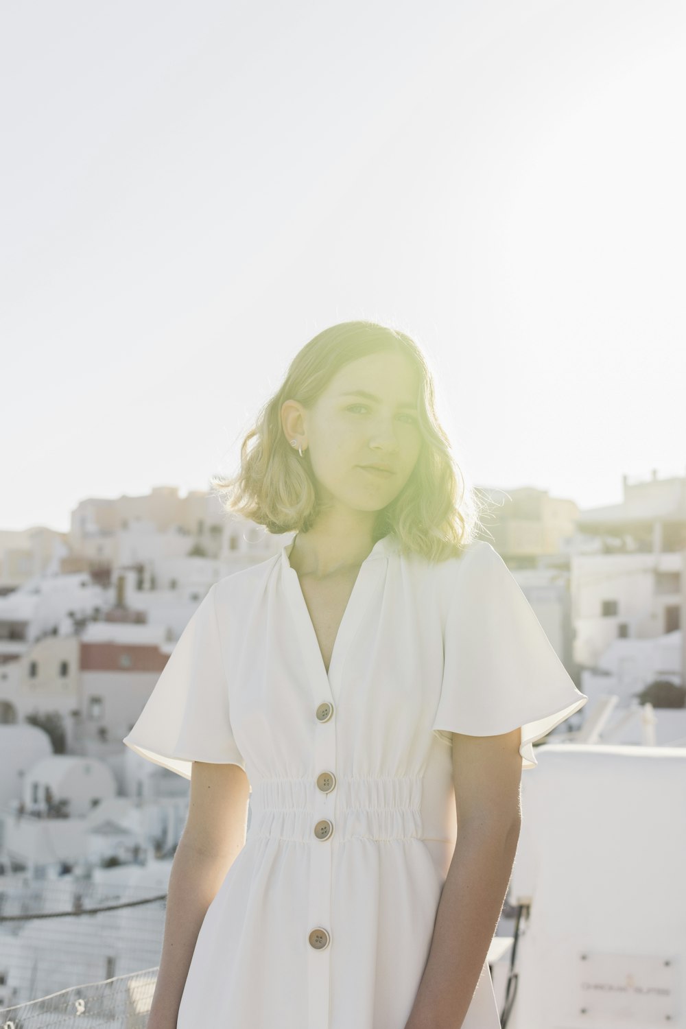 shallow focus photo of woman in white dress