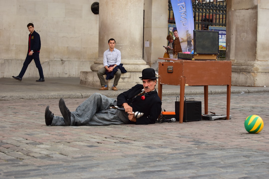 Charlie Chaplin sitting on the street - digital marketing guide - Photo by Rudy Issa  | best digital marketing - London, Bristol and Bath marketing agency