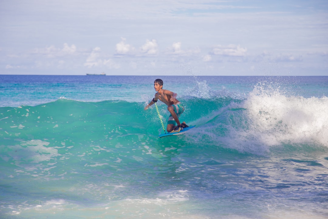 man surfing during day