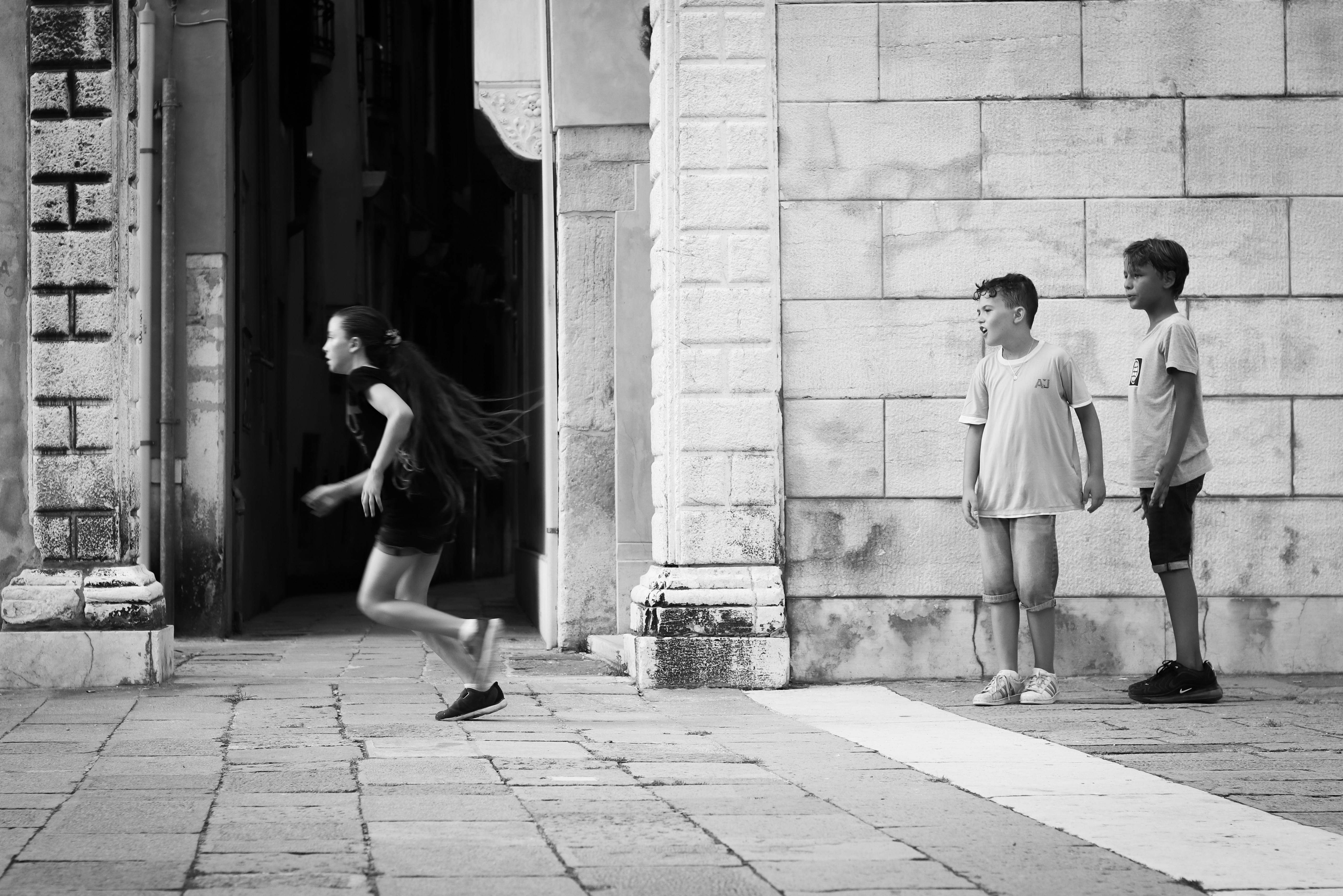 grayscale photo of running woman