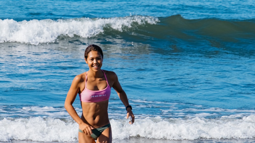 woman walking on seashore