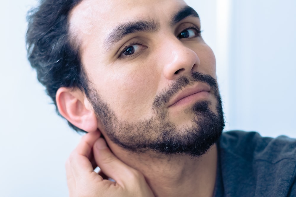 man wearing blue shirt