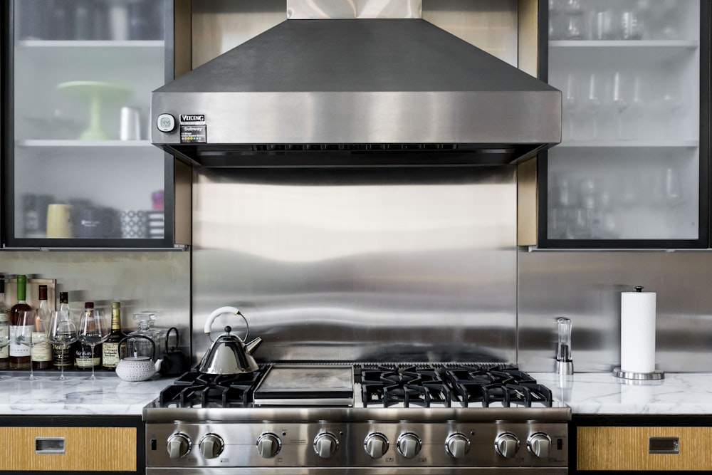 silver gas range oven with counter range