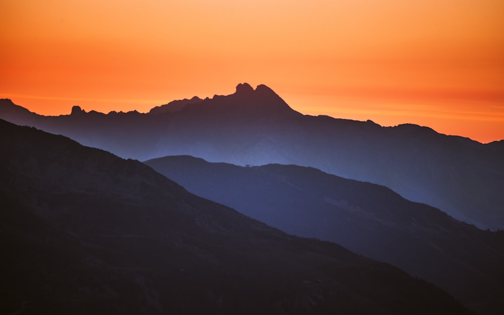 mountain silhouette during golden hour
