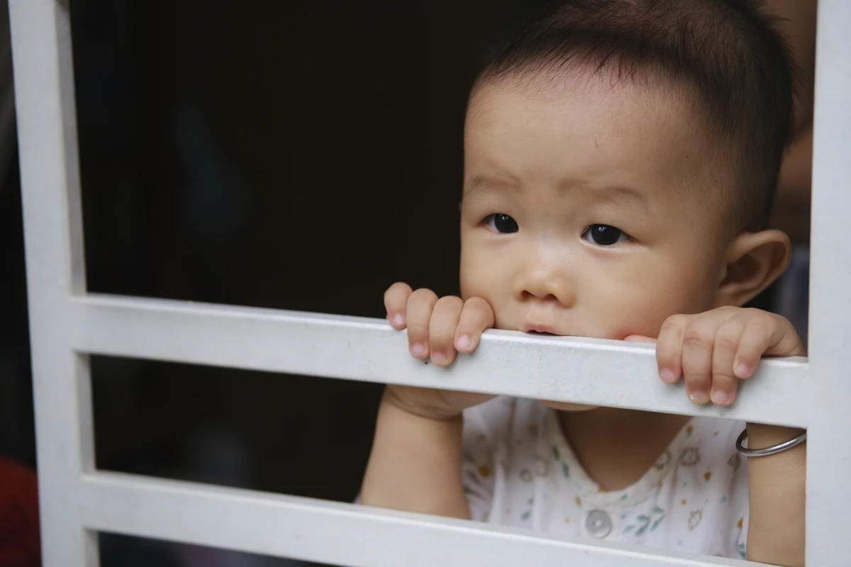 baby wears white shirt
