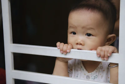 baby wears white shirt