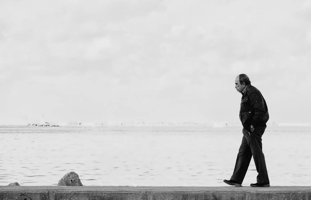 man walking on dock