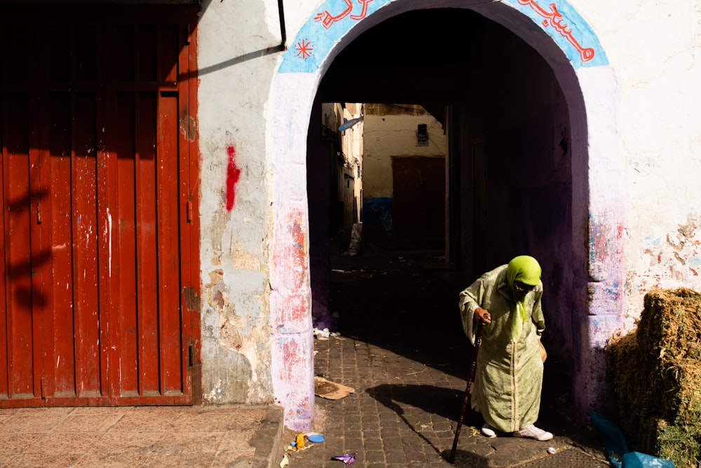 person in front of tunnel