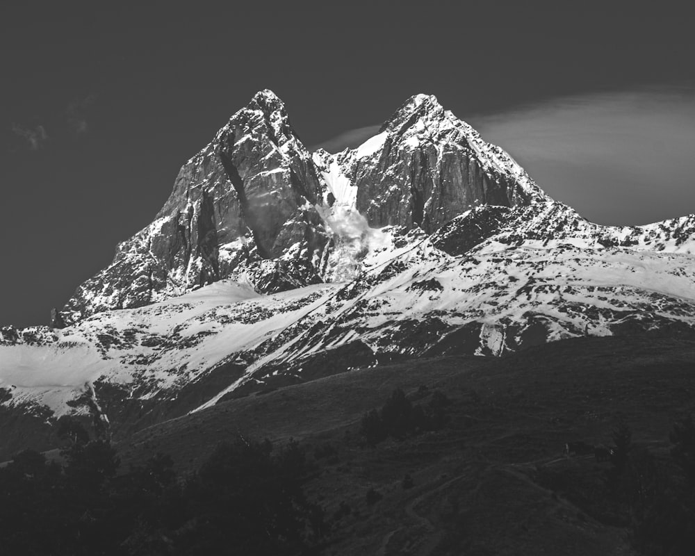 grayscale photo of snow-covered mountain