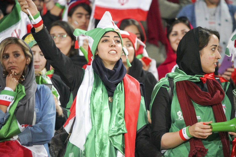 women wearing green tops