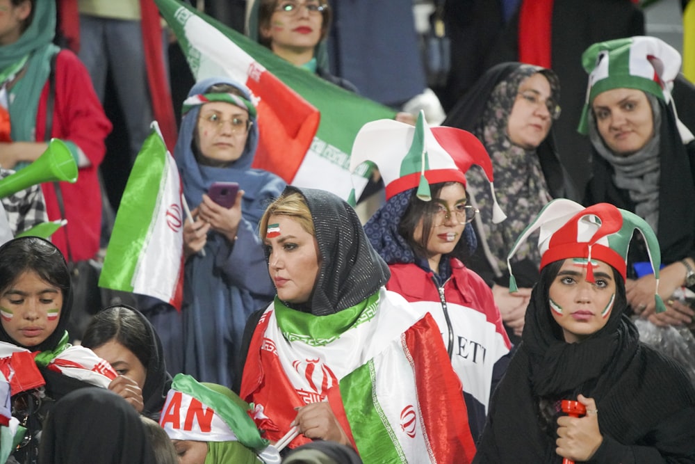 people holding Italy flag