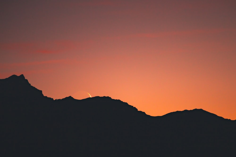 silhouette sunset mountain