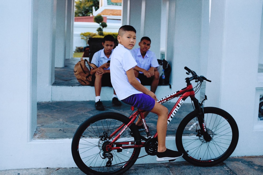 boy riding on bike