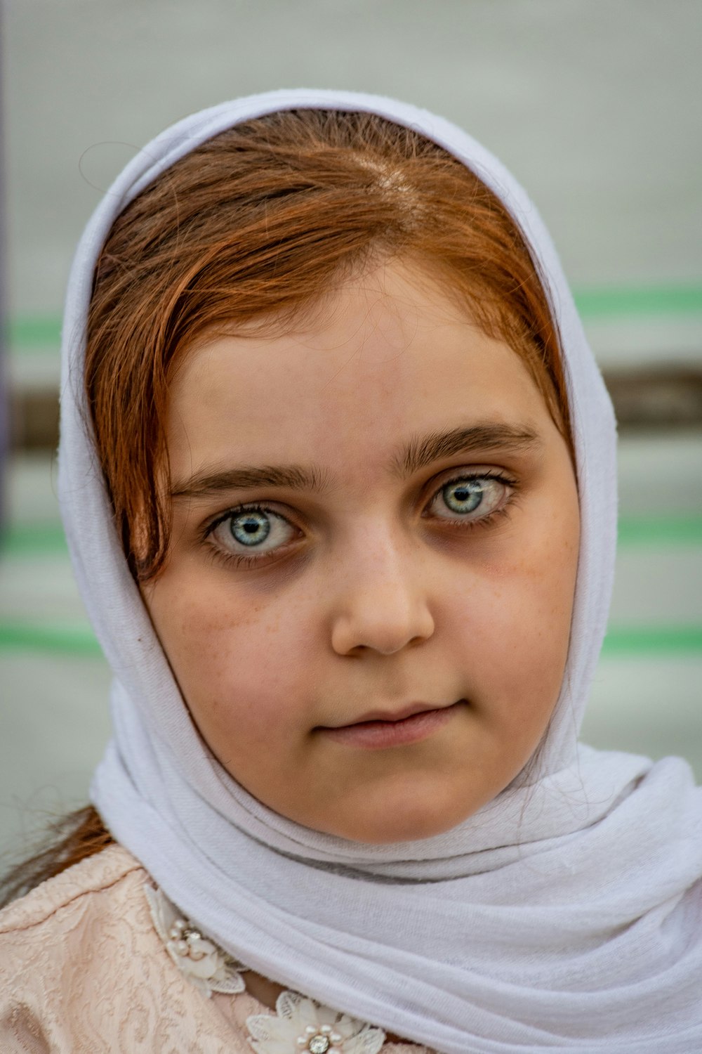 girl wearing white scarf