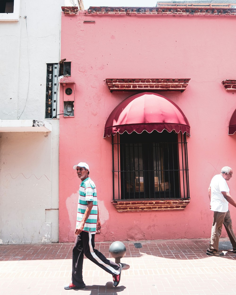 men walking beside street