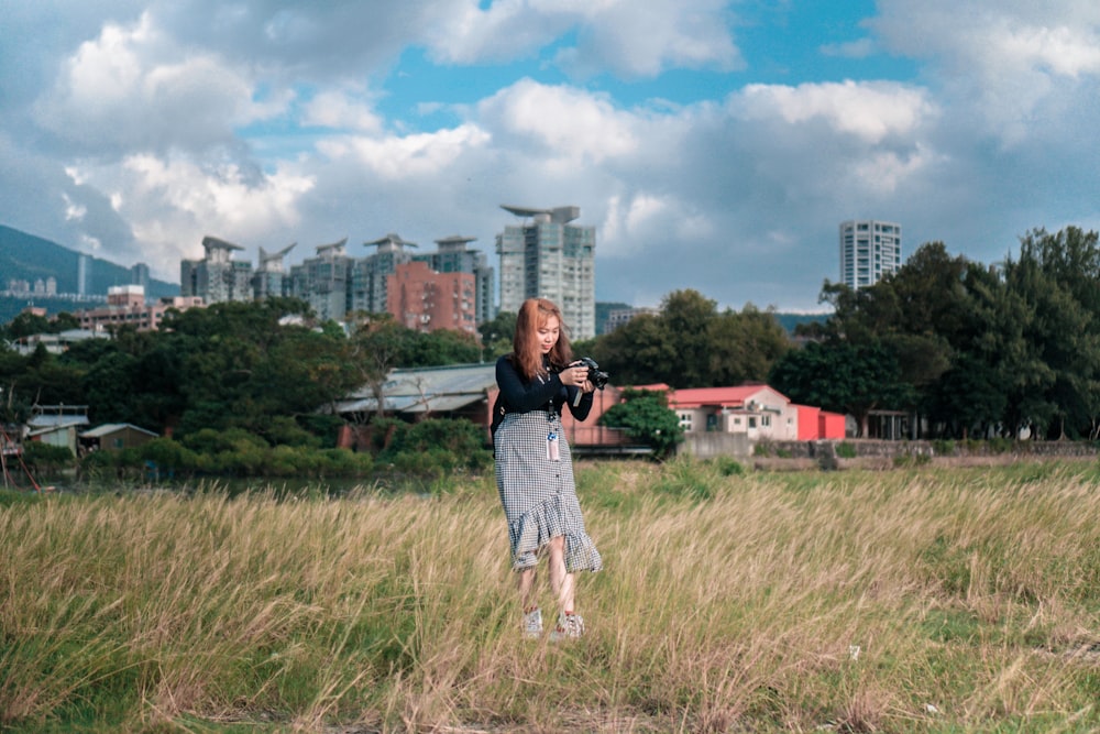 woman standing on field