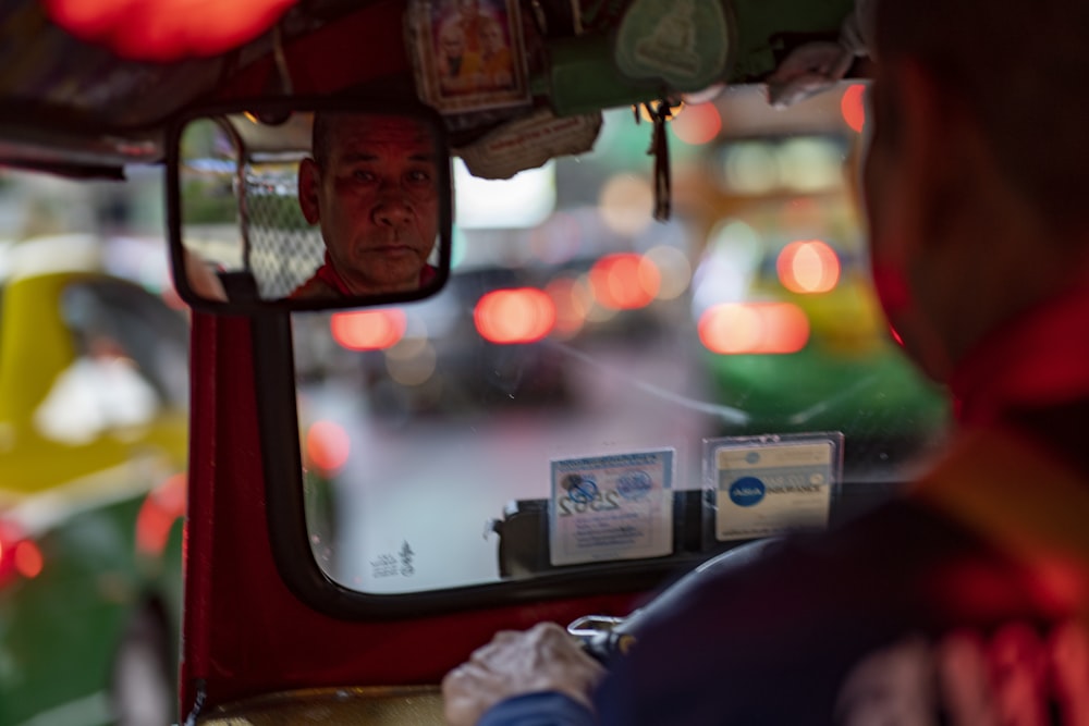 man riding vehicle