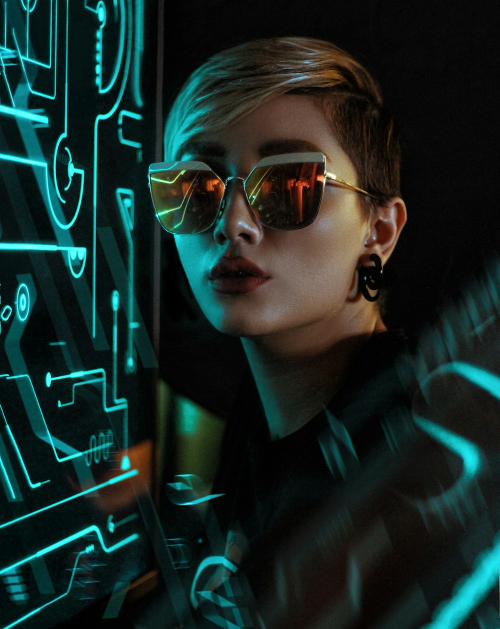 shallow focus photo of woman wearing orange sunglasse