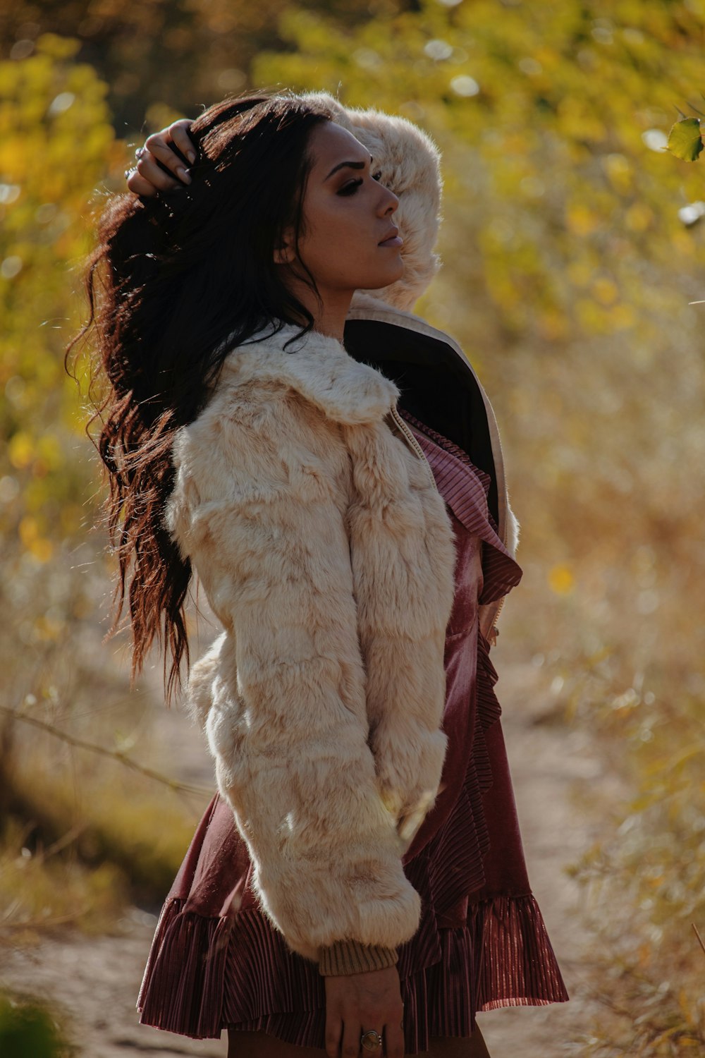 woman wearing beige coat