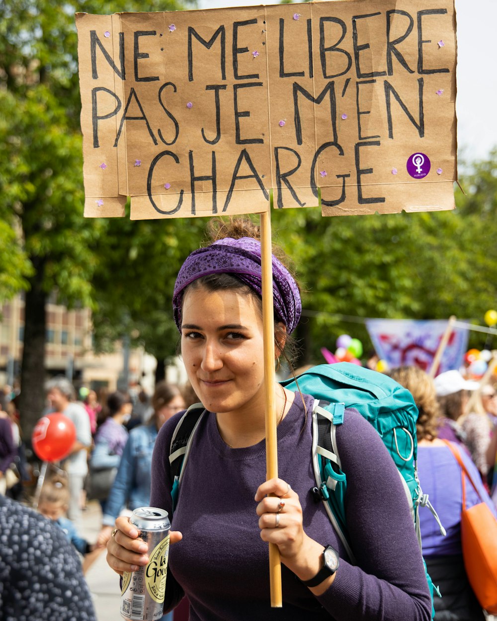woman holding signage