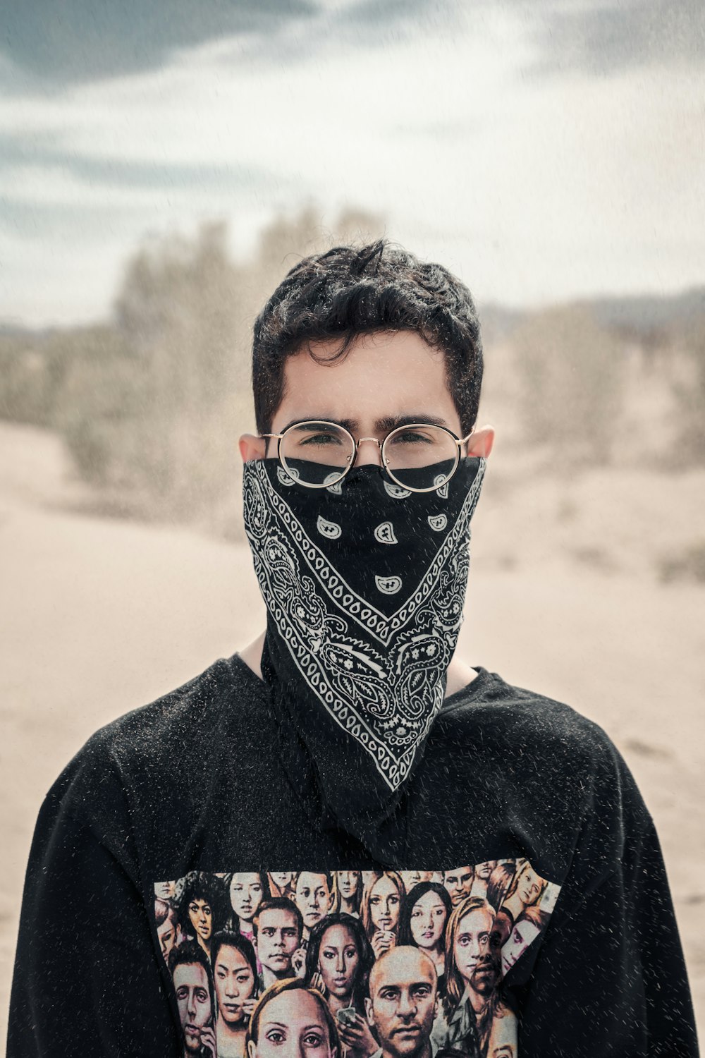 man in black and brown printed shirt