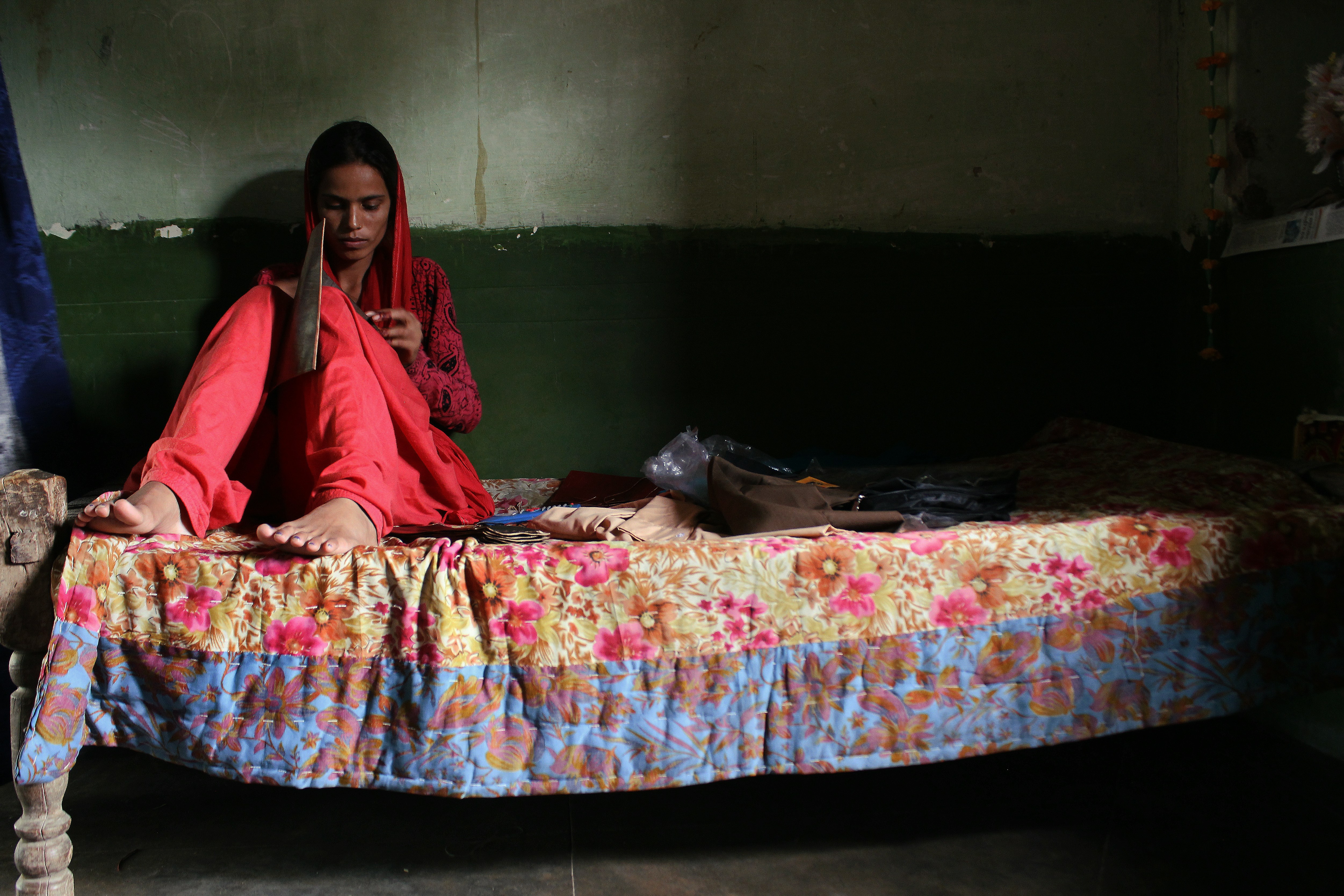 unknown person sitting indoors