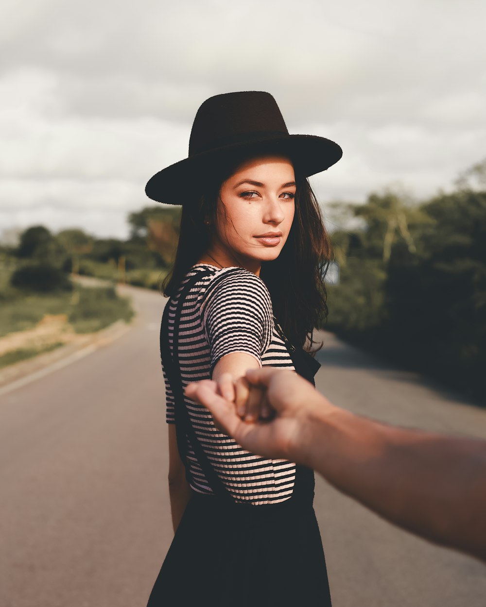 selective focus photography of woman looking back