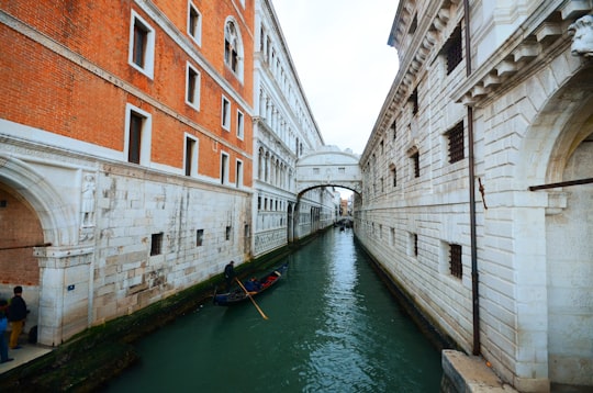 boat near building in Bridge of Sighs Italy