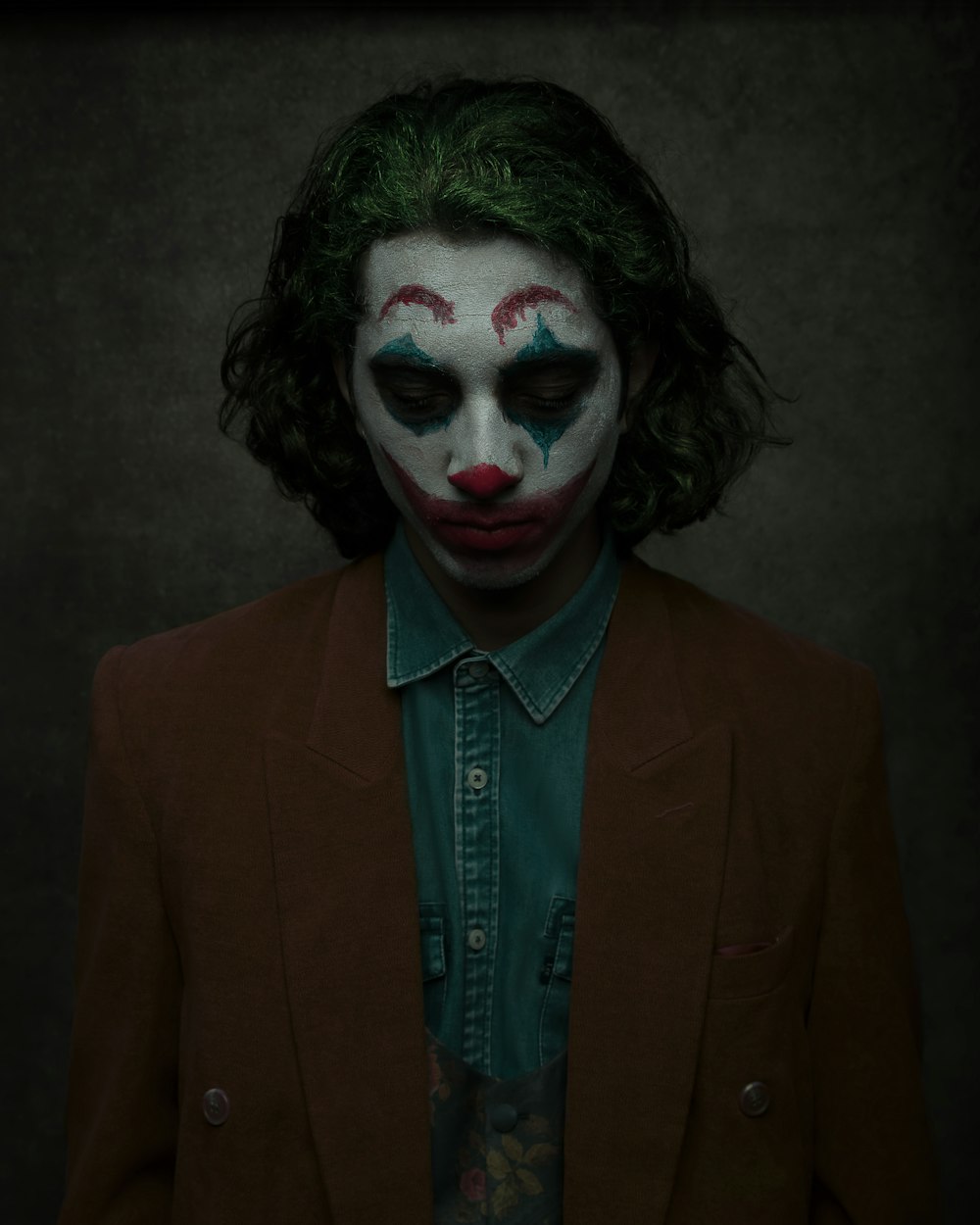 man in joker make up