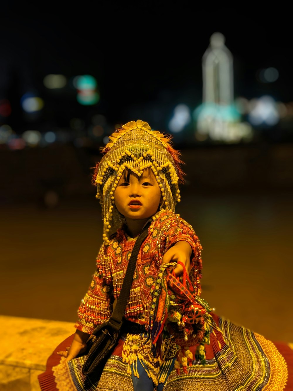girl in multicolored traditional dress