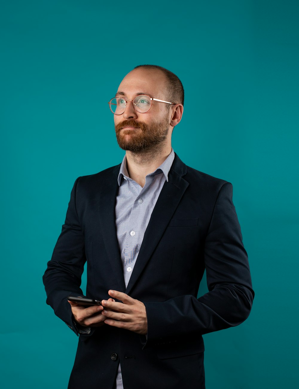 man wearing black suit