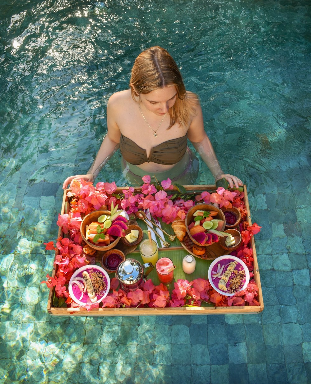 tray of fruits on pool