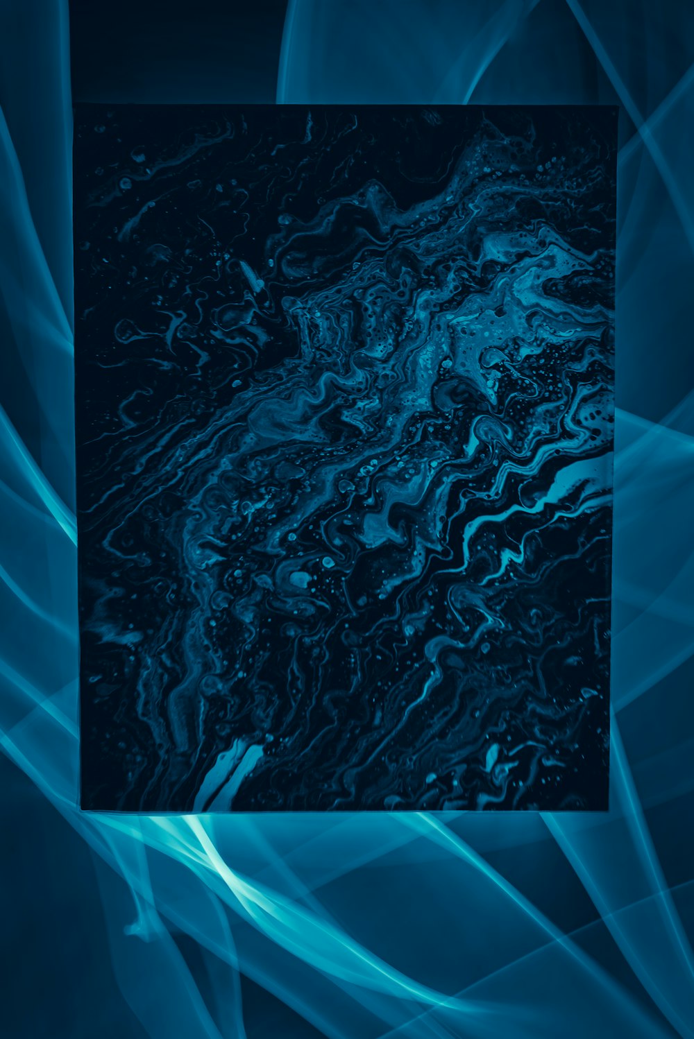 a blue abstract background with a square in the middle