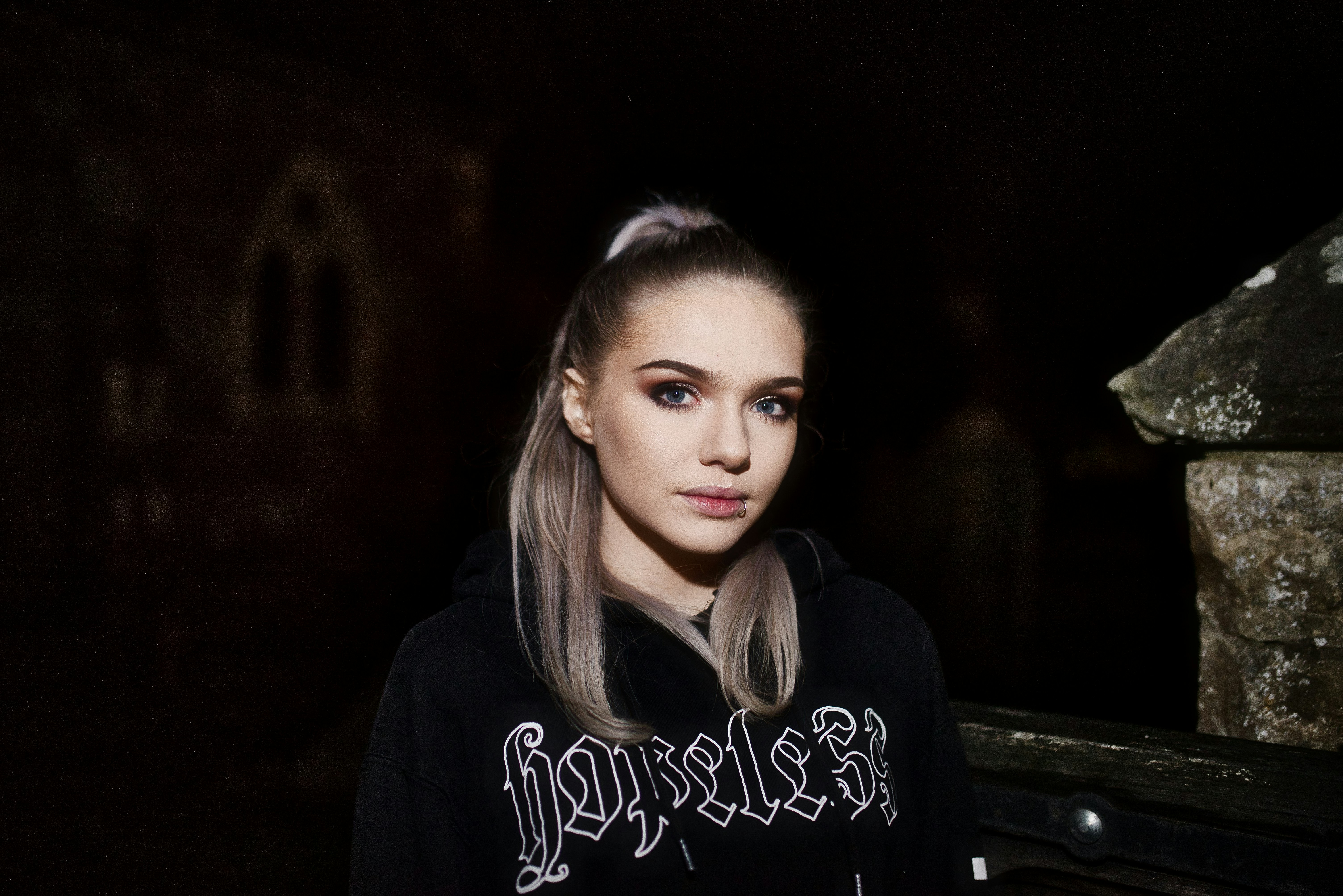 woman wearing black shirt (Photo by Michael Austin on Unsplash)
