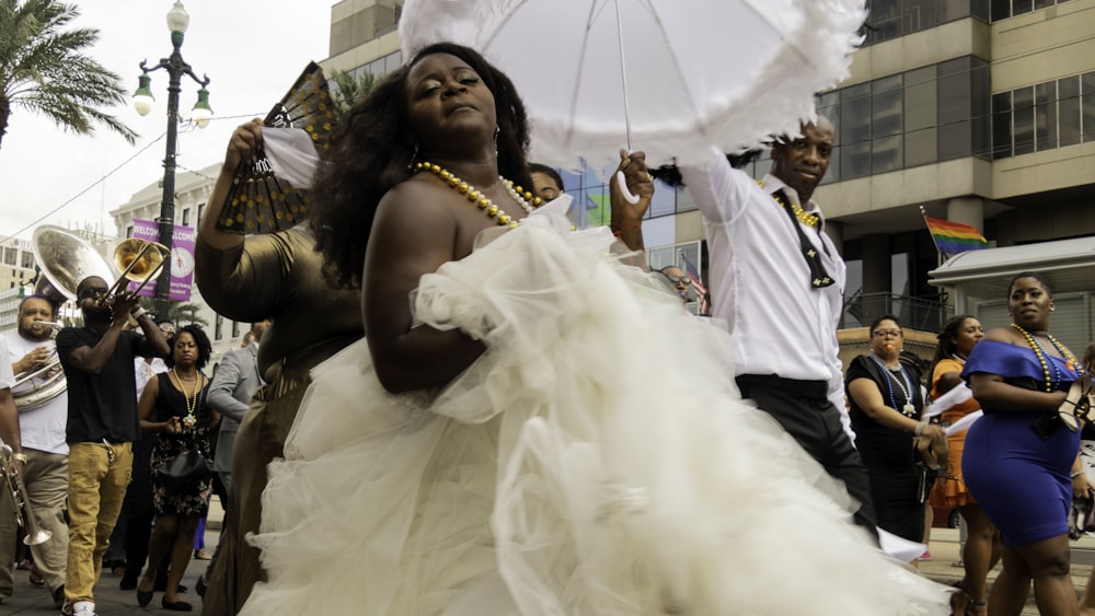 woman wearing white wedding dress during daytime