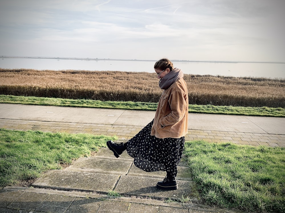 standing woman on stairs during daytime