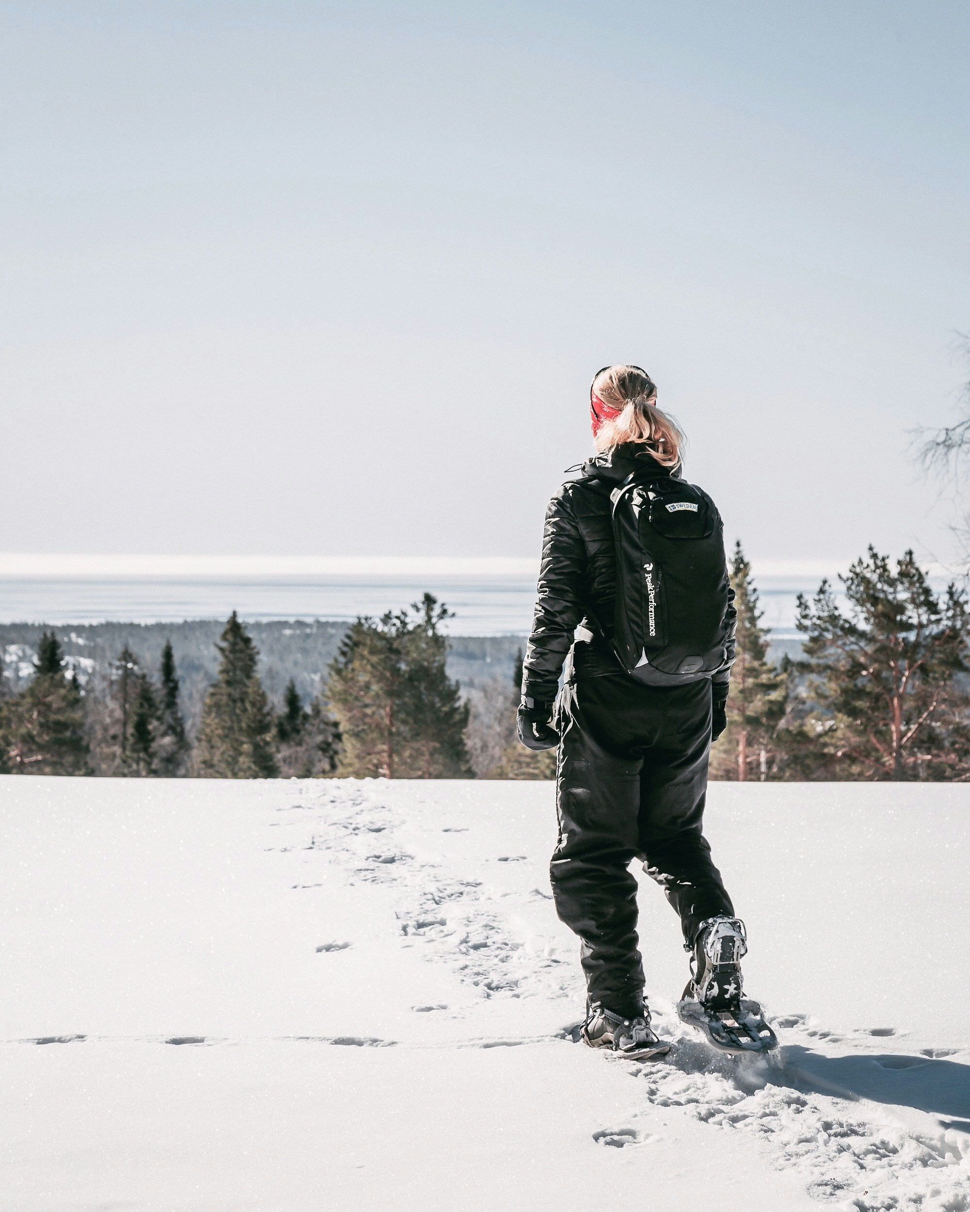 woman standing on snow field