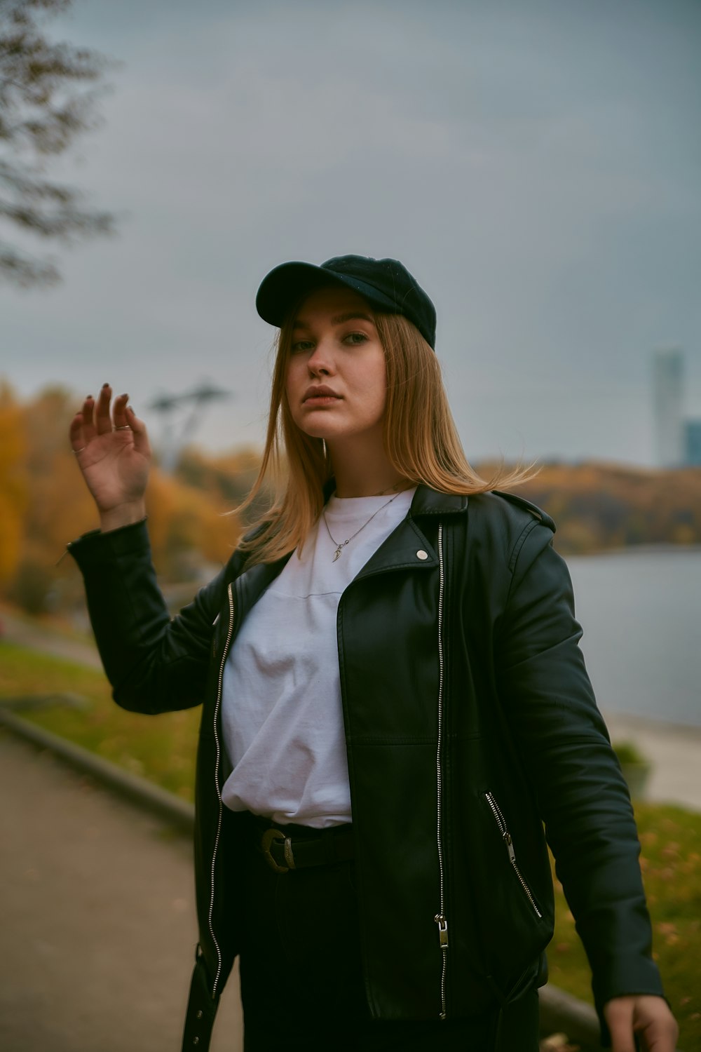 woman wearing black leather jacket