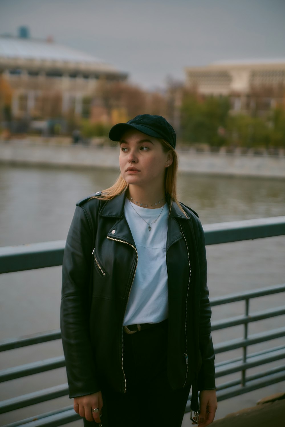 woman in black leather zip-up jacket