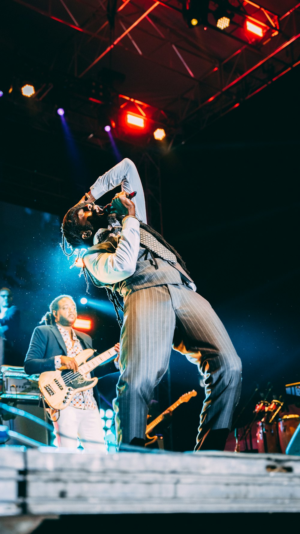 people playing musical instruments on stage